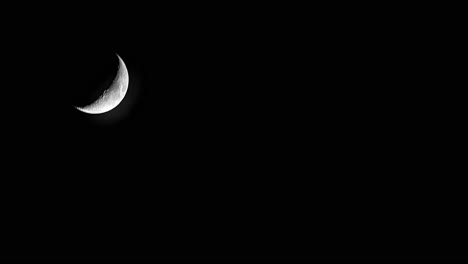 Motion-timelapse-of-crescent-moon-moving-fast-from-end-to-another