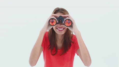 Brunette-haired-woman-looking-through-binoculars