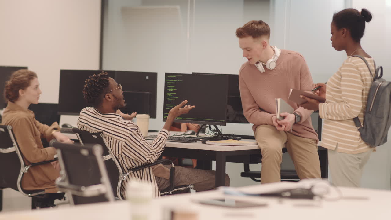 Group of Students Chatting at IT Class