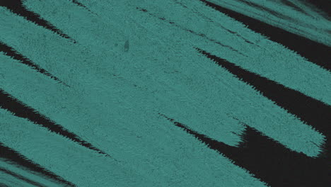 a grayscale image featuring a bold blue brushstroke across it, likely created with a paintbrush for an artistic effect