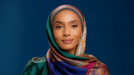 portrait of a woman wearing a colorful hijab
