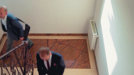 top view of businesspeople moving on office stairs