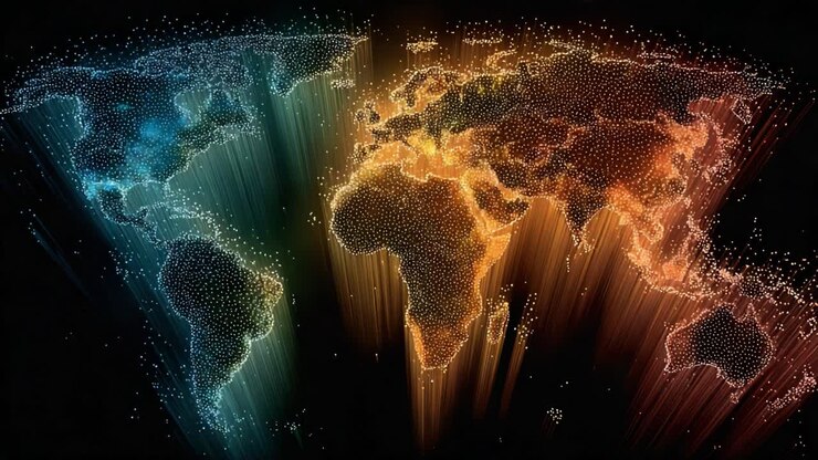 Mappa astratta e futuristica del mondo composta da punti luminosi con scie di luce colorate, che rappresenta la connessione globale, la tecnologia, i big data e la comunicazione di rete internazionale su sfondo nero.