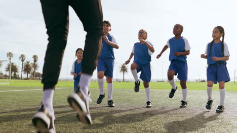 Children,-leg-warm-up-and-sport-on-soccer-field