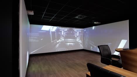 High-tech-meeting-room-with-wall-projections-and-modern-seating-arrangements