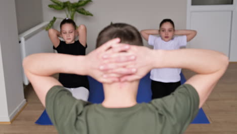 kids practising yoga