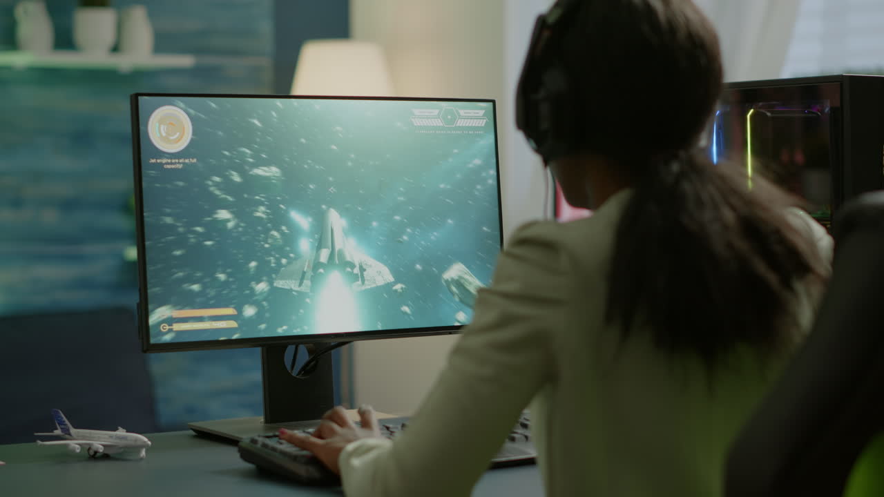 아프리카 프로 에스포트 게이머 가 경쟁적 인 비디오 게임 에서 헤드 ⁇  을 착용 하고 있다