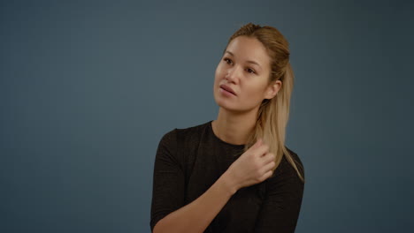 woman looking off camera wondering