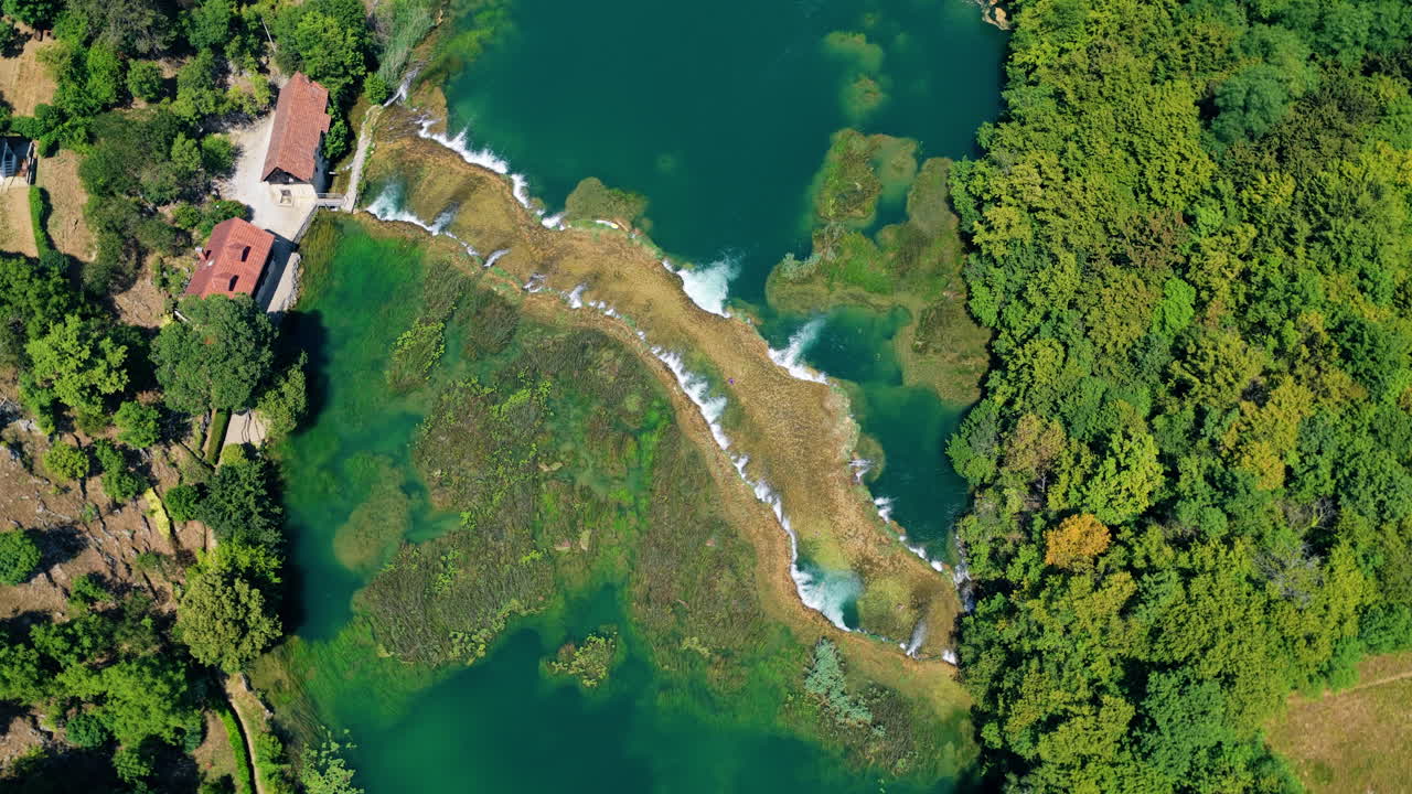 Above View Of Waterfalls And Clear Waters Of Mreznica River Near Duga Resa Town In Croatia. Aerial Rotate Shot