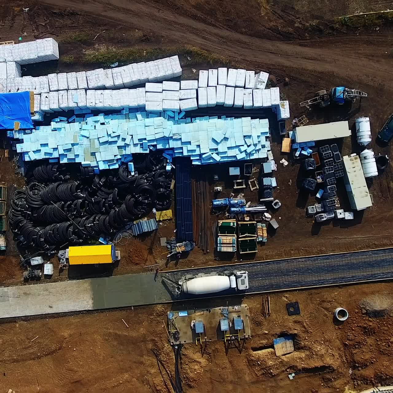Heavy machinery on construction zone of bio gaz factory. View from above on modern ecological plant building