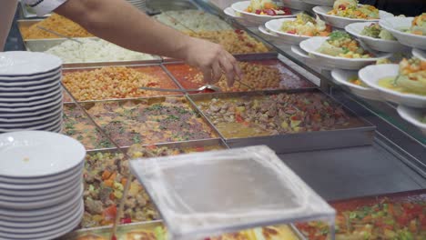 serving food at a turkish buffet