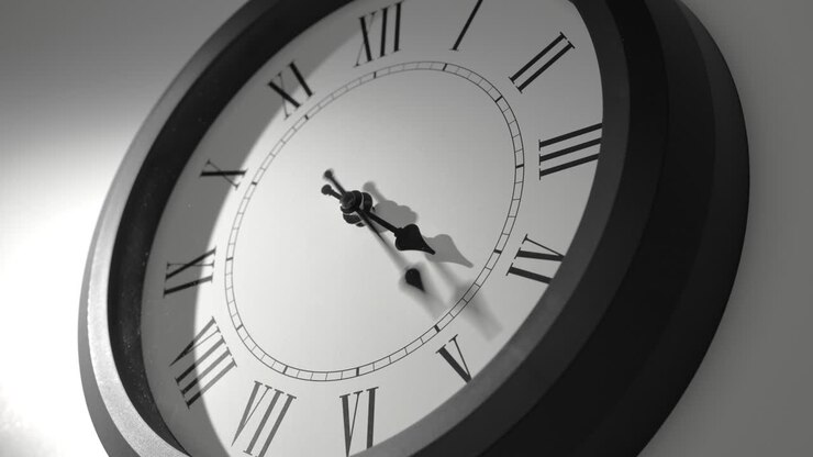 Latin Clock Face in Time Lapse on White Wall