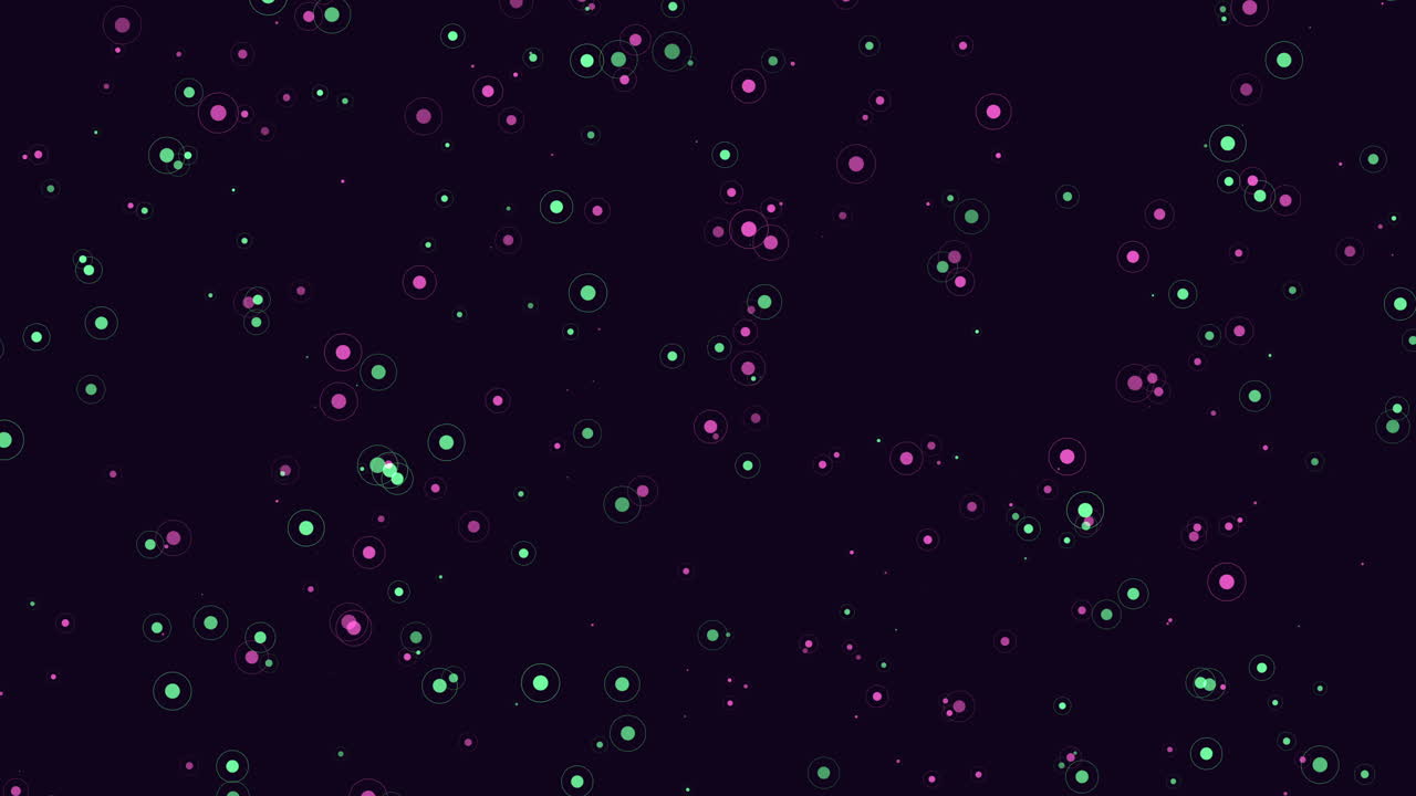 녹색과 분홍색 점들이 떠다니는 추상적인 어두운 배경