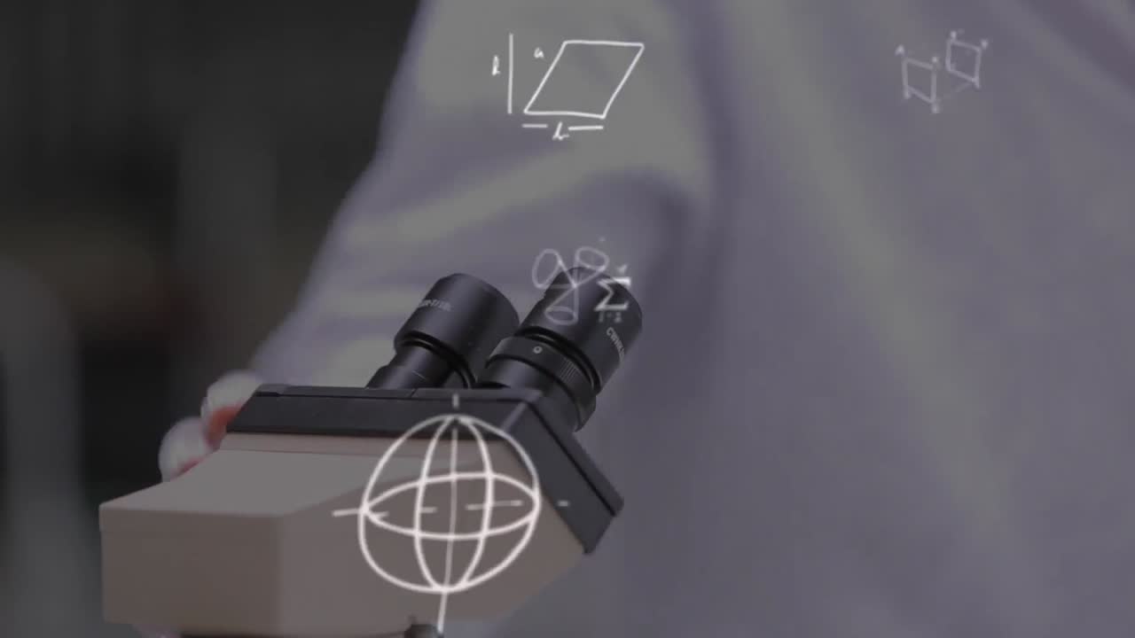 diagramas matemáticos contra trabajadores de la salud masculinos y femeninos utilizando el microscopio en el laboratorio