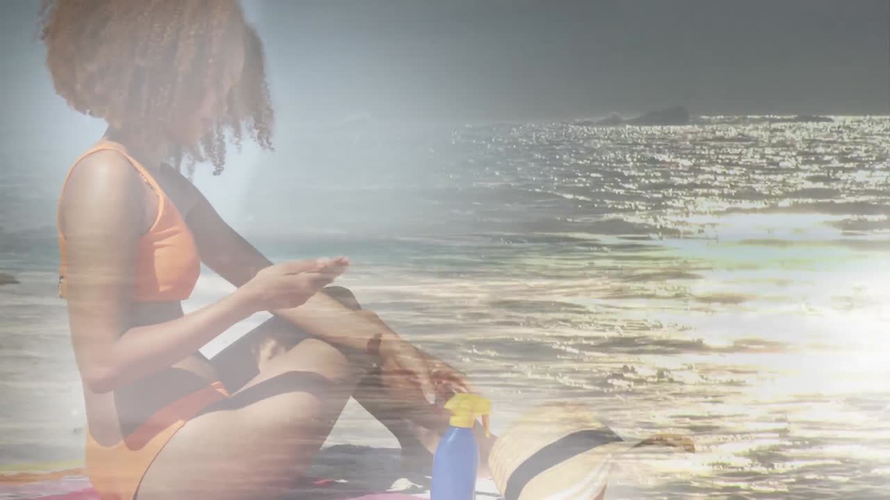 비키니를 입은 행복한 아프리카계 미국인 여성이 바다 위의 해변에서 휴식을 취하는 애니메이션