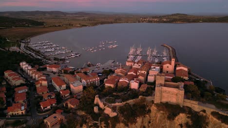 talamone, a fishing village with an old castle close to national park maremma in tuscany, italy