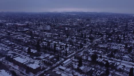 this breathtaking drone footage of a foggy winter downtown reveals a moody, atmospheric cityscape, as if viewed through a dreamlike haze