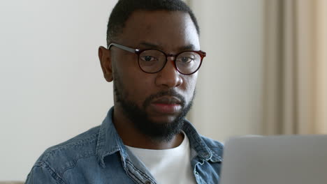 man working on laptop