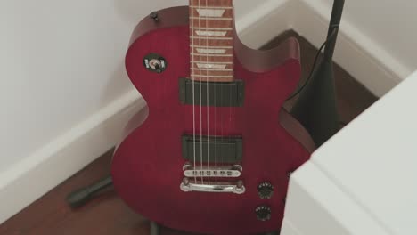 classic red electric guitar shines with timeless rock appeal