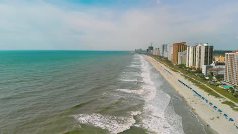 Stunning-areal-video-sequence-of-coastline-and-residential-area-near-the-coast-at-Myrtle-Beach,-South-Carolina,-USA