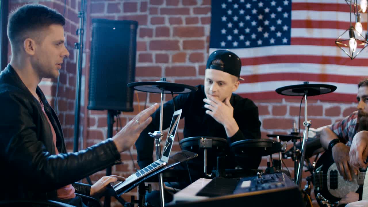 Creative band setting music and practicing