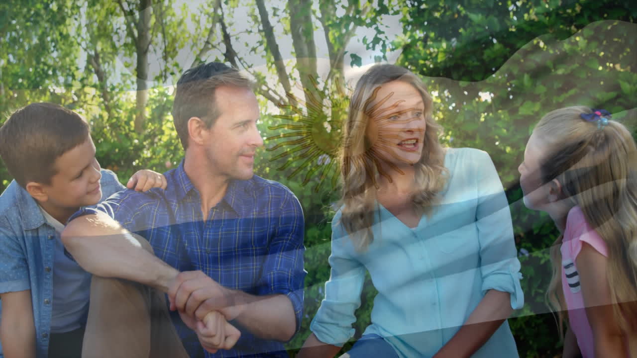 анимация флага аргентины над кавказской семьей, проводящей время в парке