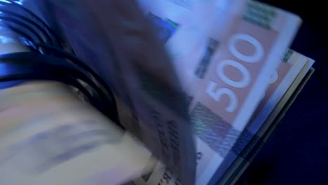 counting ukrainian hryvnia bills