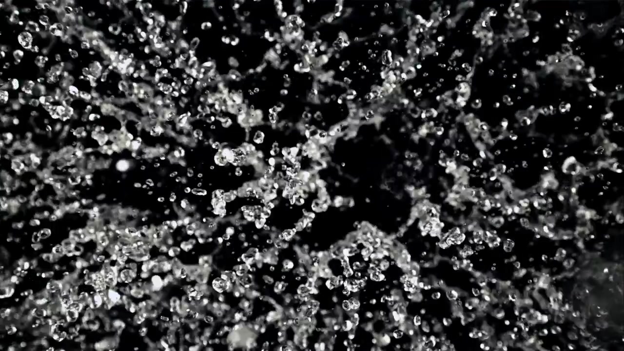 Slow Motion Water Droplets Splashing on Black Background