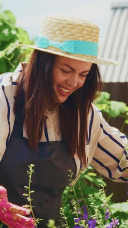 A Joyful Gardener Tending to Vibrant Flowers in a Sunny Garden, Showcasing the Delight of Growing Plants and Enjoying Nature&#039;s Beauty