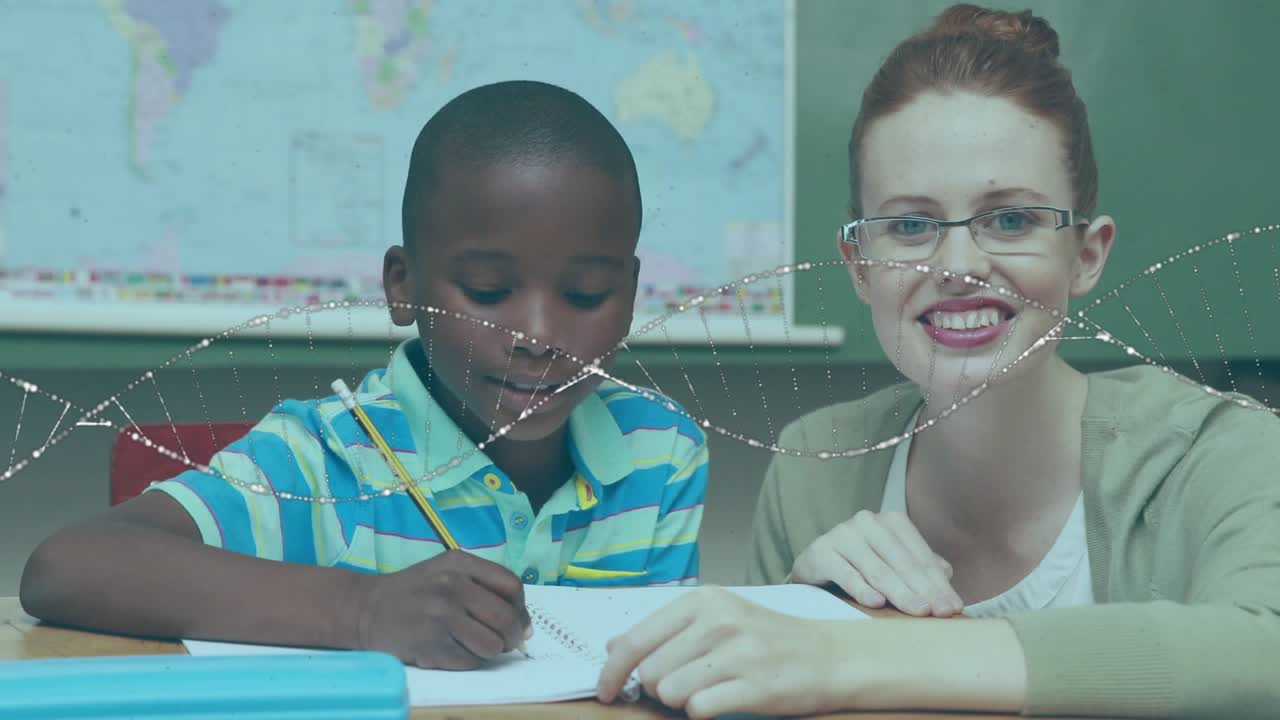 Tutor leaning over desk, pointing at notebook and guiding student writing practice by classroom map