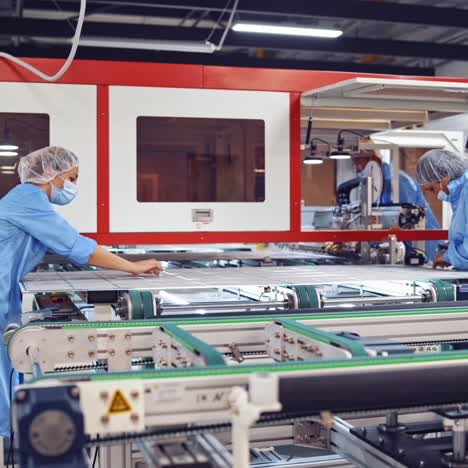 workers inside modern factory background. production of new details in technologically advanced factory. modern industries.