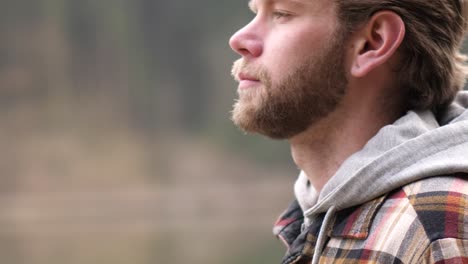 a-close-up-of-a-face-of-a-blond-young-man-with-a-beard