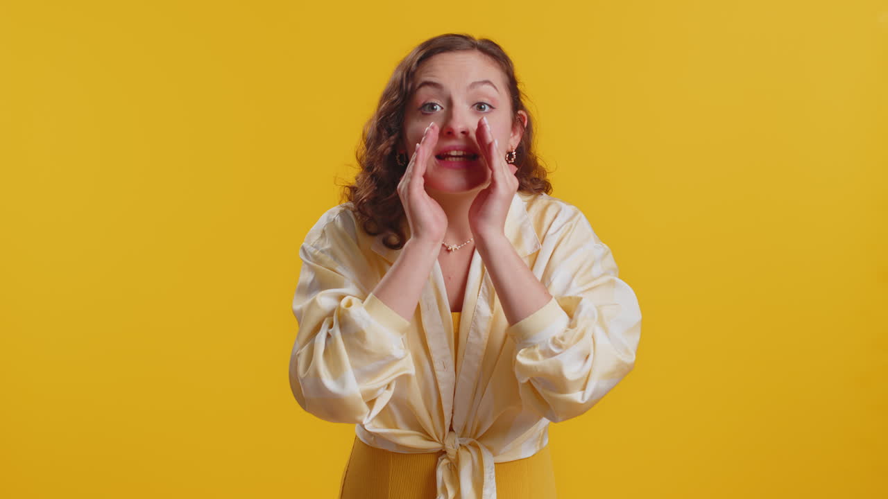 Young woman whisper news rumors holding hands near mouth share gossip quiet keep my secrets