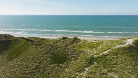 An-aerial-view-from-behind-the-sanddune-can-be-seen-of-the-beach-and-the-North-Sea