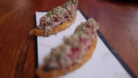 close-up of gourmet food on a wooden table