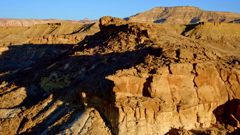 overhead glide revealing the sculptural elegance and rich hues of the toadstool hoodoos.