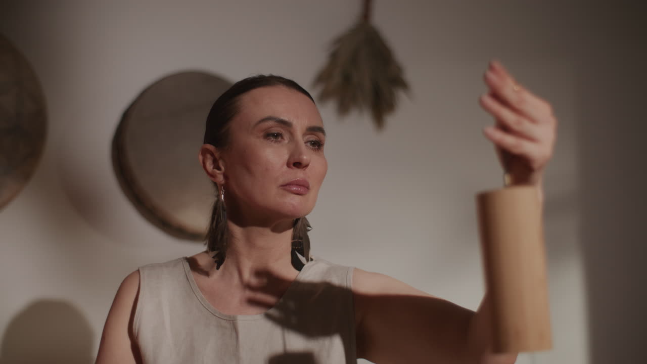 Woman playing a percussion instrument