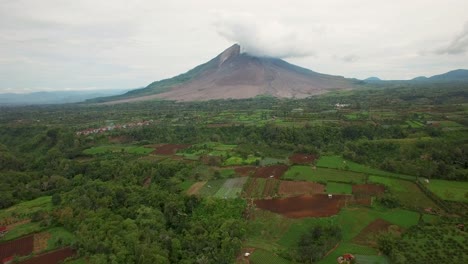 aerial drone shot of vulcano sinabung in indonesia