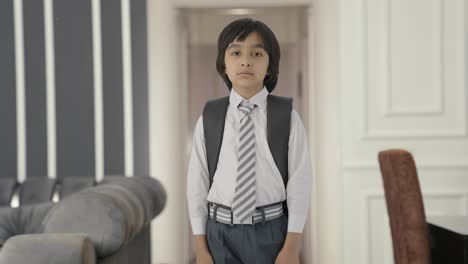 Serious-Indian-school-boy-looking-at-the-camera