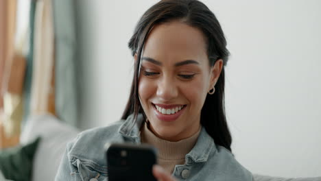 woman, smile and typing on smartphone in home