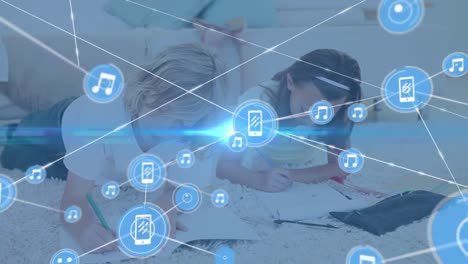 animation of network of connections with icons over diverse schoolchildren writing