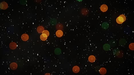composición de video con nieve sobre luces coloridas borrosas