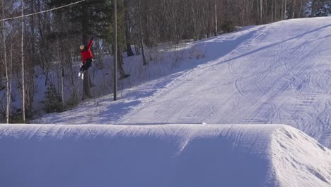 Close-beautiful-slow-motion-shot-of-alpine-skier-jumping