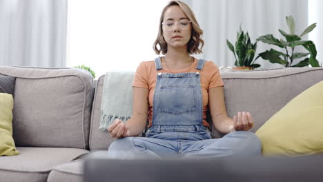 yoga, woman on couch and meditation to relax