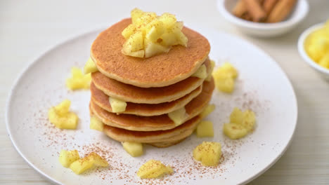 apple pancake or apple crepe with cinnamon powder