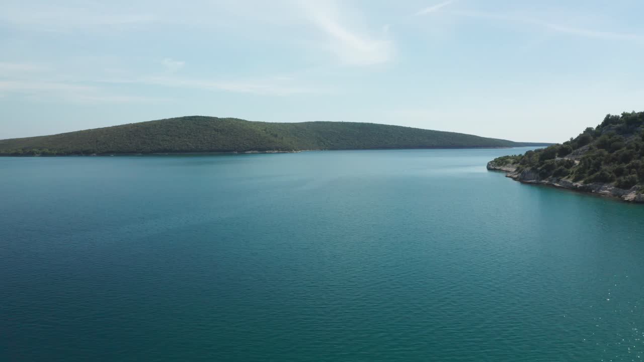 Aerial panorama shot of small island group on a sunny day