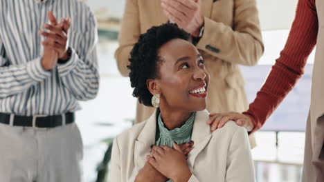 woman receiving applause for her success