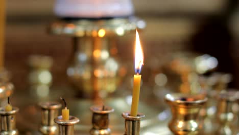 church candles burn close up