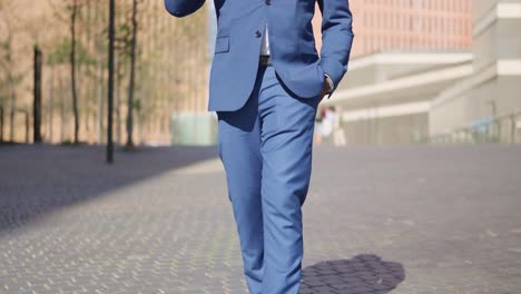 A businessman walking in the city