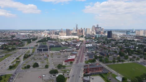 corktown neighborhood and detroit skyline, michigan, usa with corner ballpark in the foreground